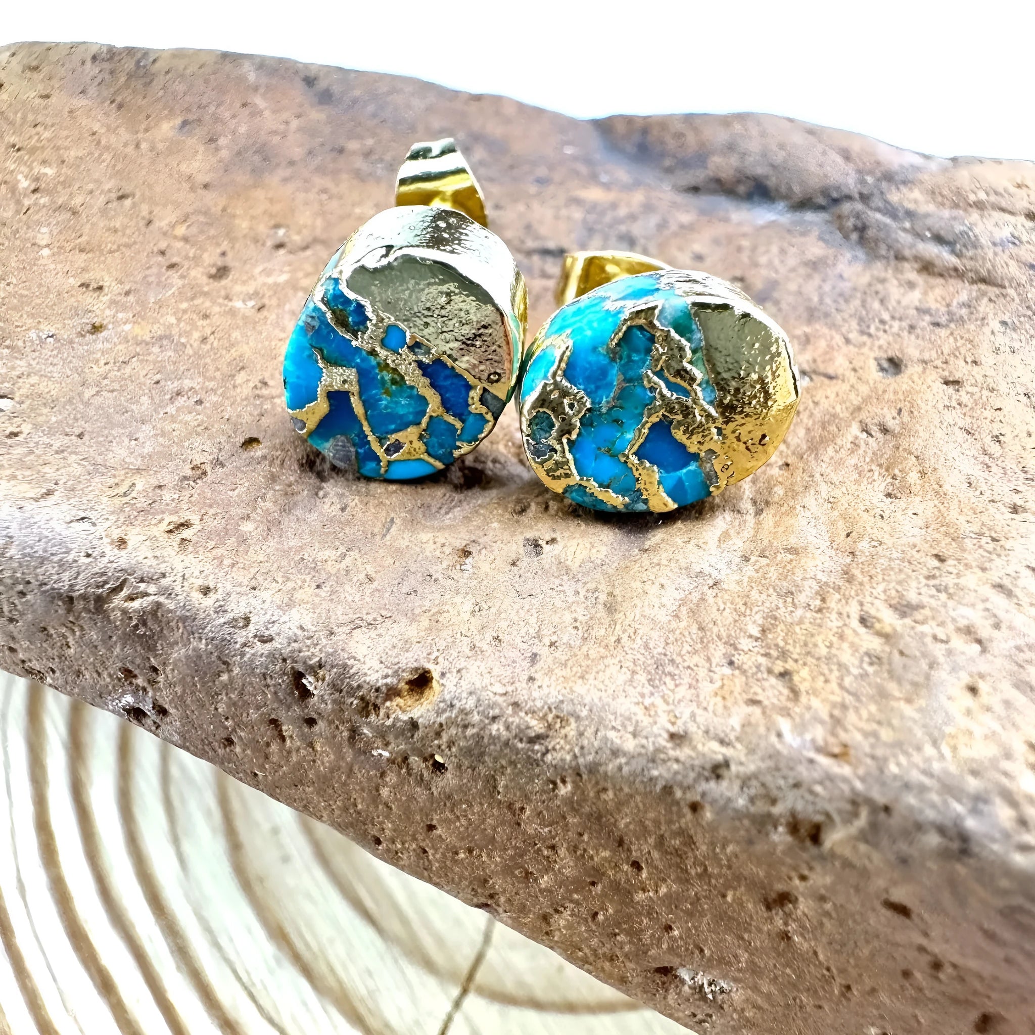Natural stone bohemian stud earrings with irregular labradorite stones in silver settings