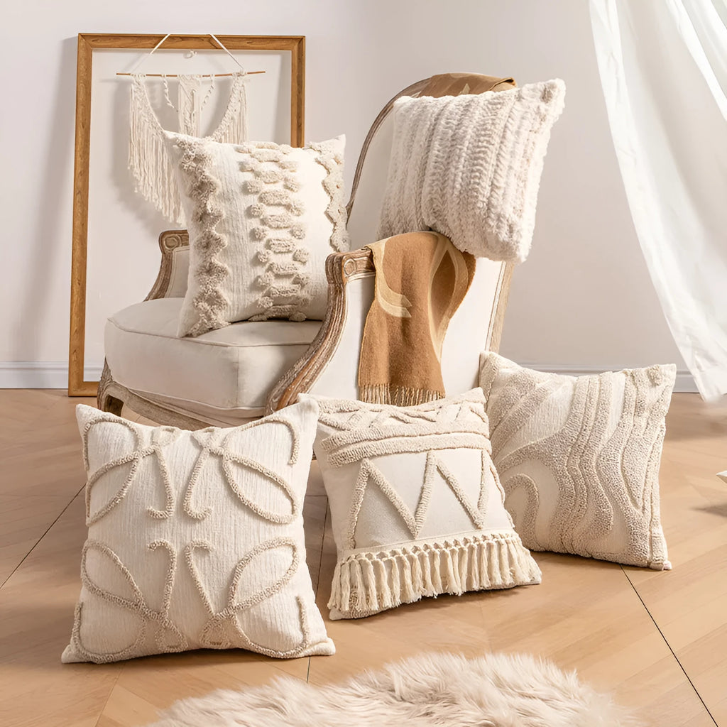 Knitted sofa cushion cover with tassel detail and striped pattern in spiral dots colour design