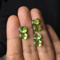 Natural olivine faceted stud earrings in S925 sterling silver with 6 × 8mm grass green oval stone
