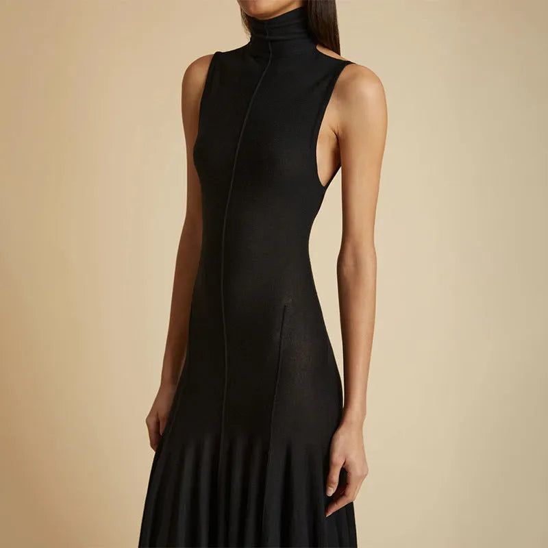 Grey women's slim-fit cotton dress with half turtleneck neckline and backless design.
