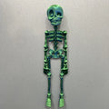 3D printed PLA skull ornament refrigerator magnet in assorted colours, 18cm high.