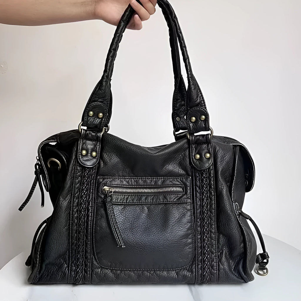 Women's retro shoulder messenger bag in soft PU leather with internal compartments and weaving detail