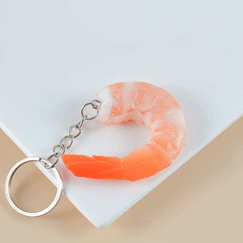 Detailed PVC simulation shrimp keychain with door buckle on a white background.