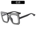 Plastic box sunglasses with multiple colour combinations including black frame grey piece and bright coloured options