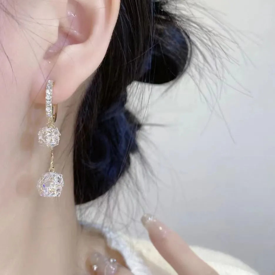 Silver drop shape earrings with tassel ball, rhinestone ball, and confession balloon pendant design