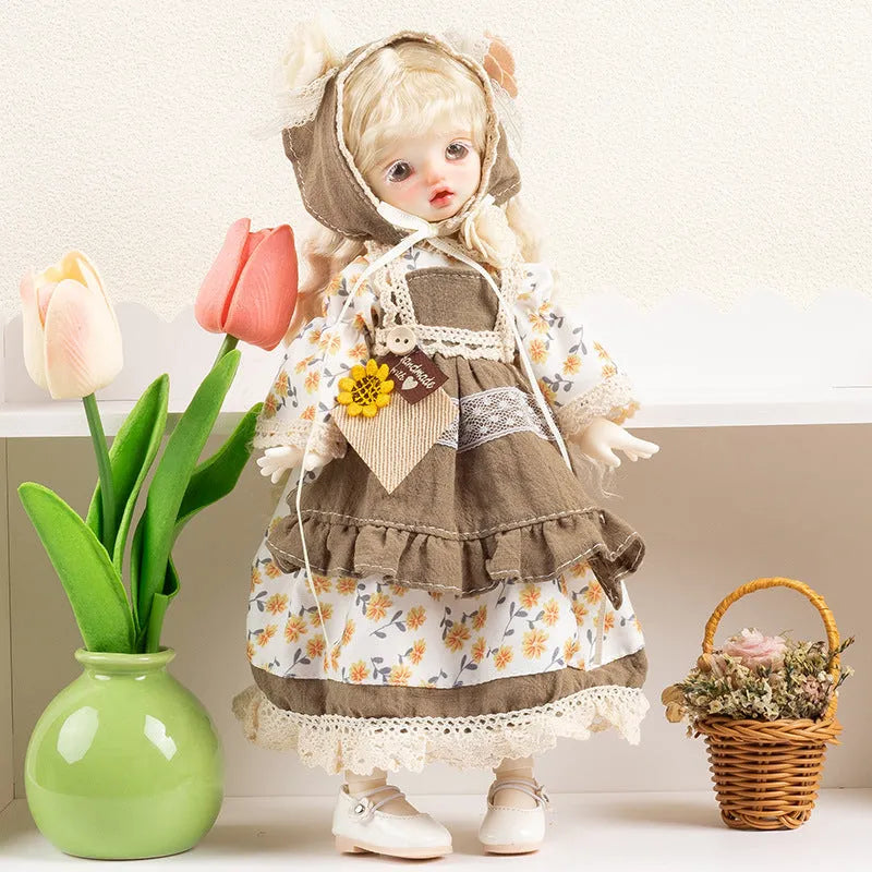 Printed cloth doll clothes for fashion dolls in various colourful patterns sold separately without dolls