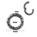 A pair of silver fashion earrings featuring a detailed totem pattern design on a stainless steel base.