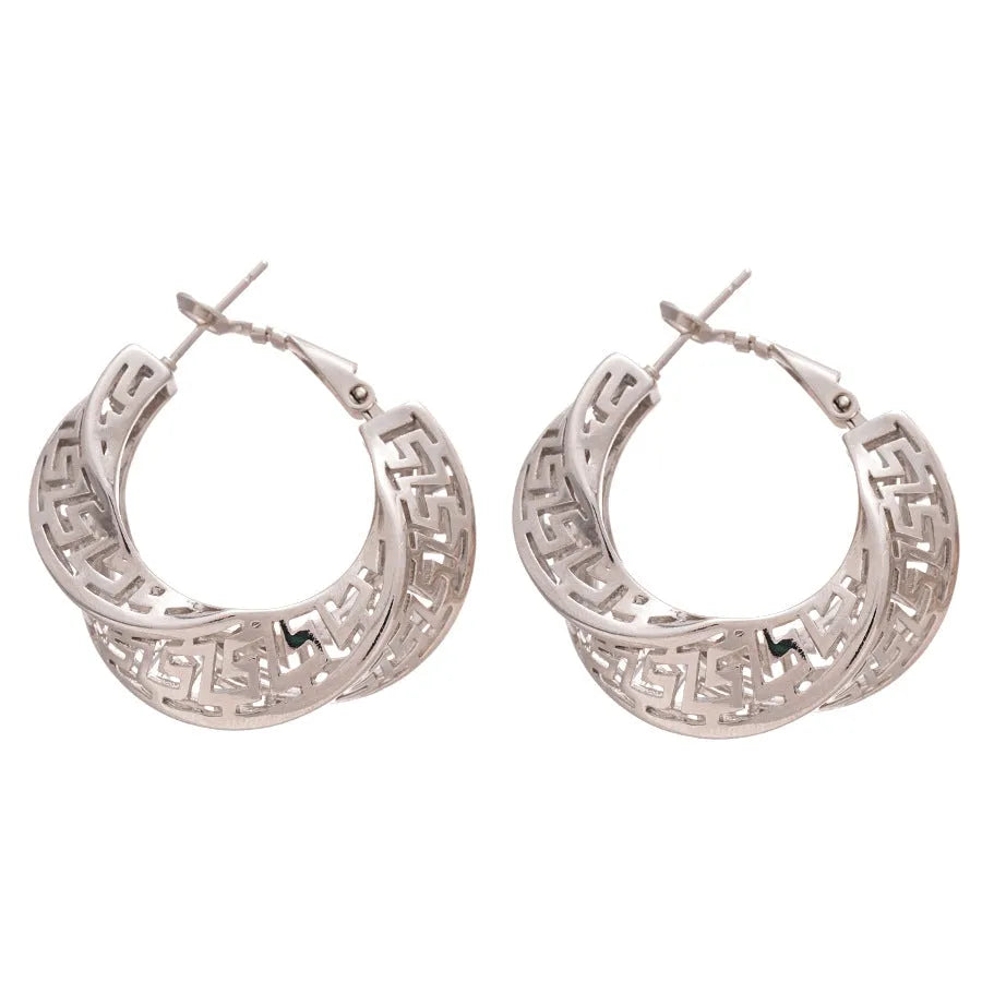 Women's geometric hollow stud earrings with twisted round design in silver or gold electroplated copper