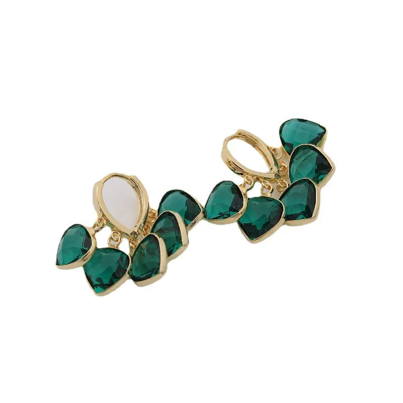 Pair of green heart-shaped pendant ear clips on a copper clip with Korean style design.