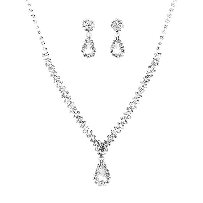 Claw chain necklace and matching earrings set with drop-shaped rhinestones in multiple colour options