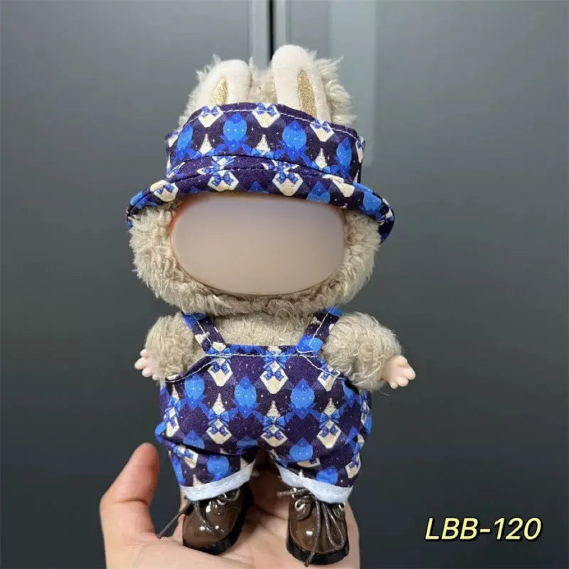 Plastic doll clothing costume for 17cm tall vinyl figurines on a display stand.