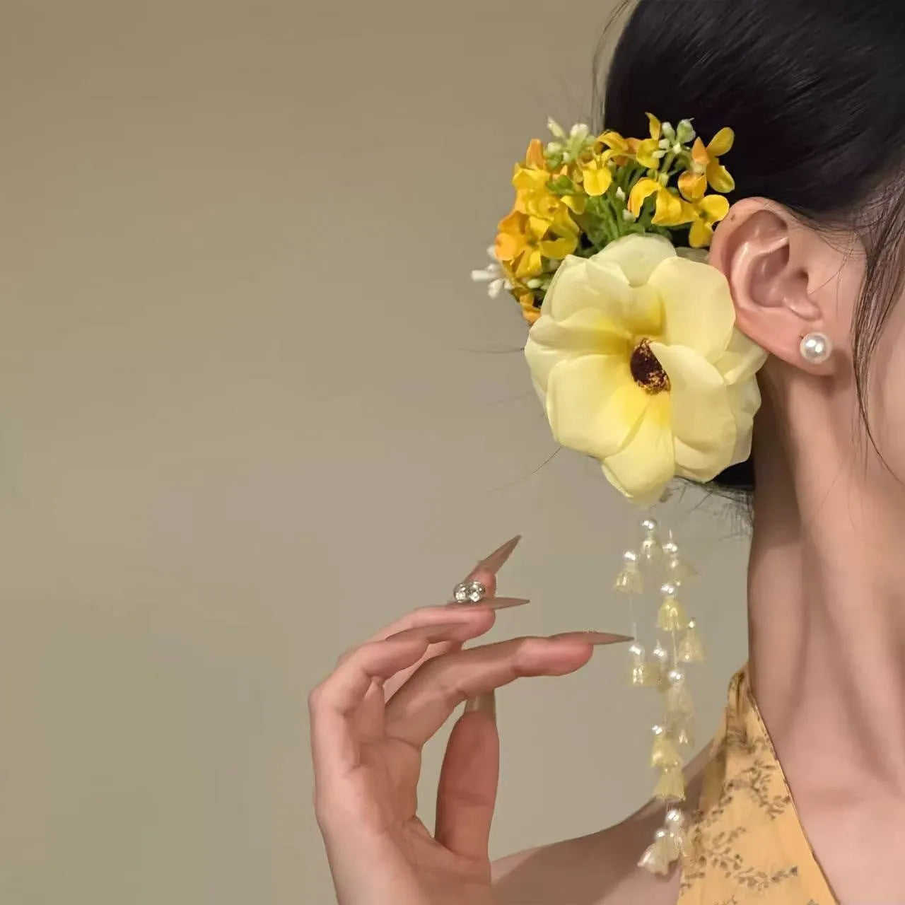Handmade floral tassel side clip hair accessory with pearl accents in yellow or purple