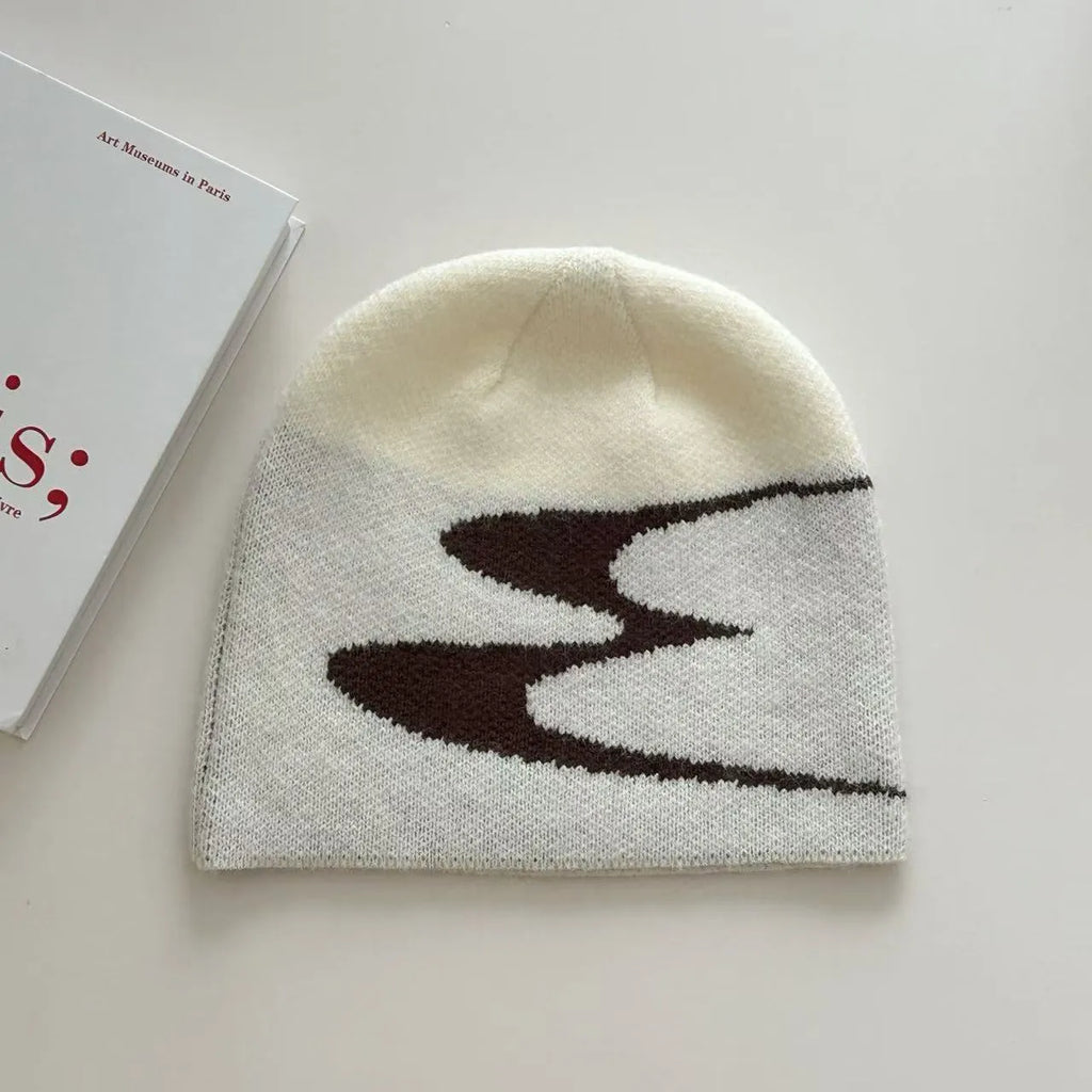 Acrylic knitted beanie hat for men and women in black, grey or white colours with thermal warmth