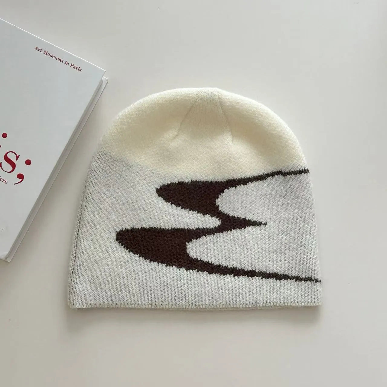 Acrylic knitted beanie hat for men and women in black, grey or white colours with thermal warmth