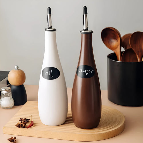 Ceramic oil pot with conical funnel and integrated brush in black, coffee or white colour