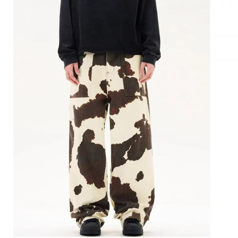Men's straight-leg casual trousers with a retro-style cows print pattern on a cotton-polyester fabric.