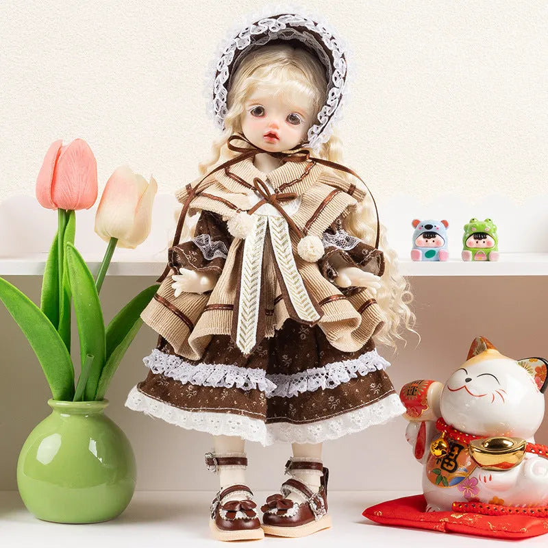 Printed cloth doll clothes for fashion dolls in various colourful patterns sold separately without dolls