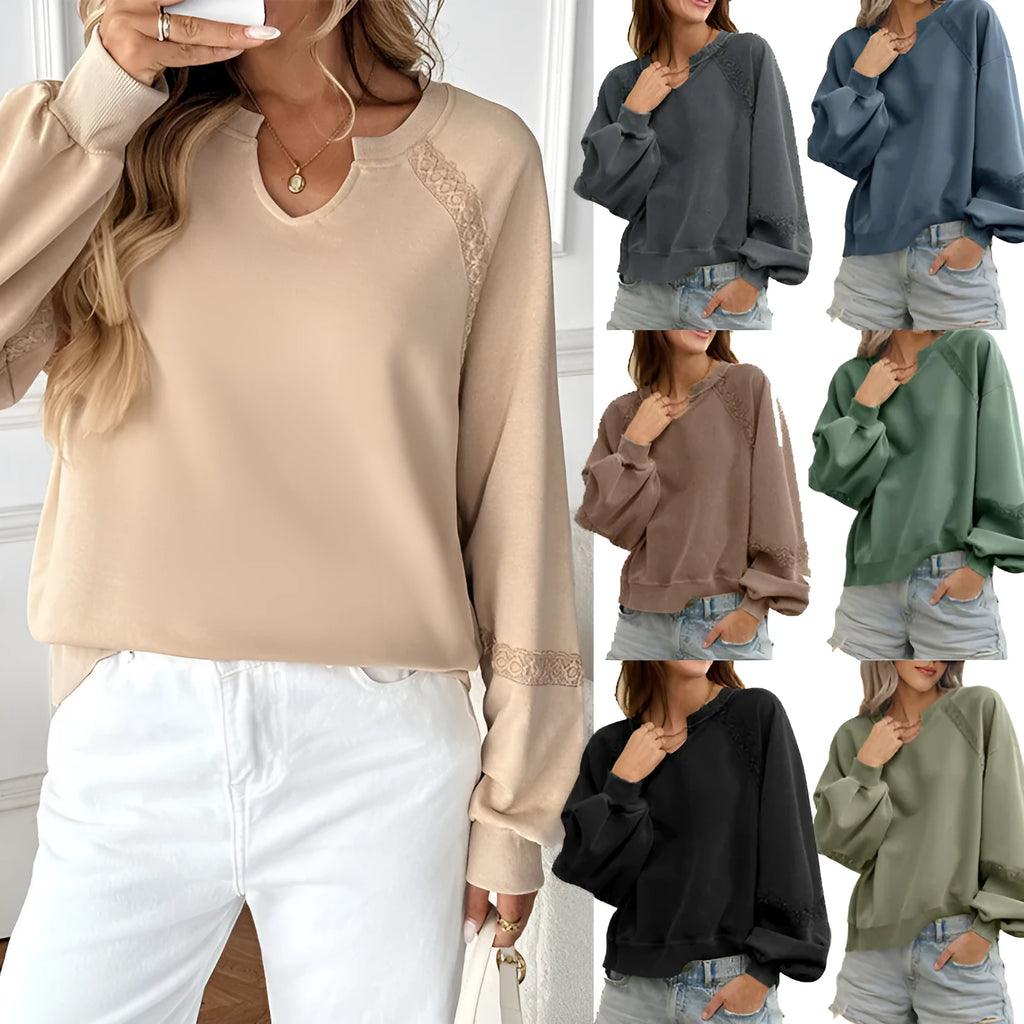 Women's loose-fitting long sleeve sweater with lace trim and a half-open collar in a solid colour.