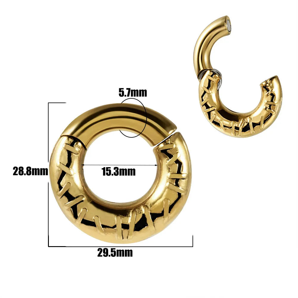 A pair of silver fashion earrings featuring a detailed totem pattern design on a stainless steel base.