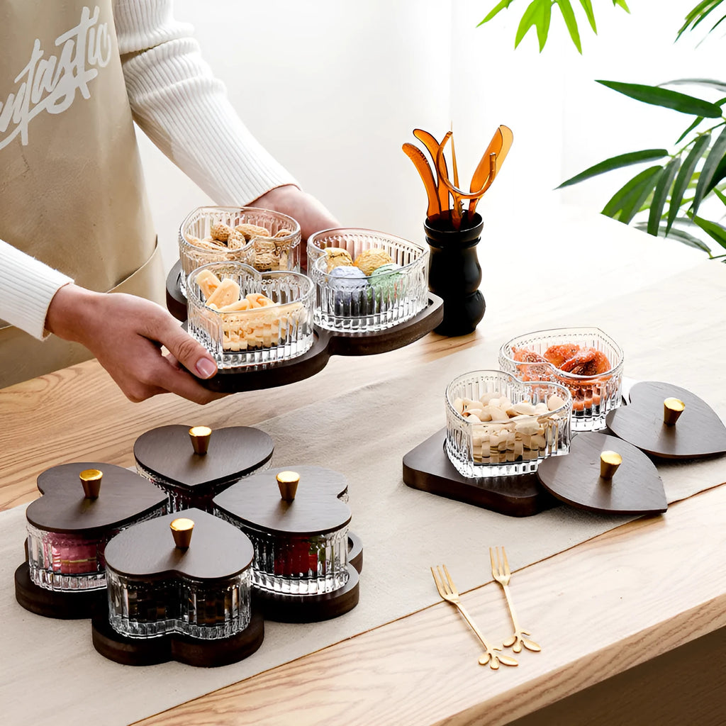 Glass fruit platter with coloured glaze and transparent heart-shaped lids in a 4-grid configuration.