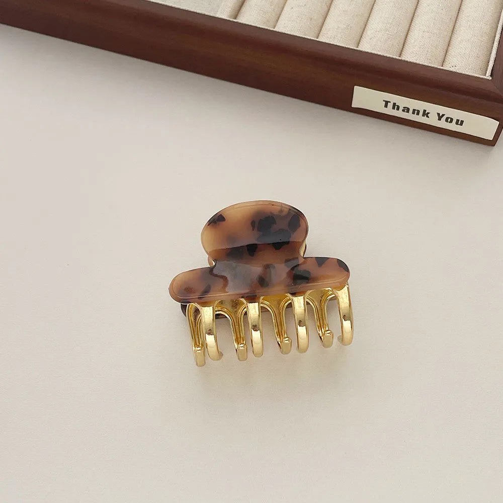 Women's retro acetate barrettes with metal grip in beige, white, ink, or leopard print colours