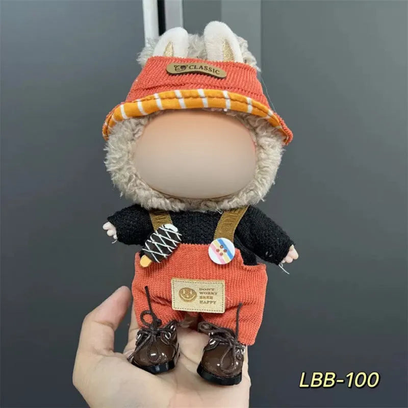 Plastic doll clothing costume for 17cm tall vinyl figurines on a display stand.