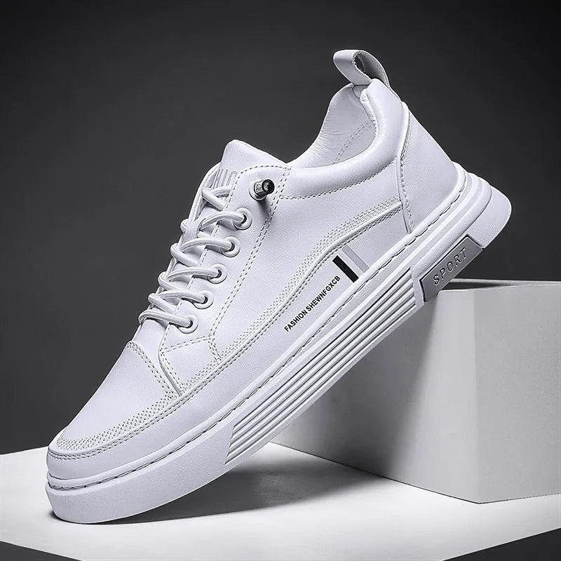 Men's white and black low-top skateboard shoes with elastic band fastening and rubber sole.