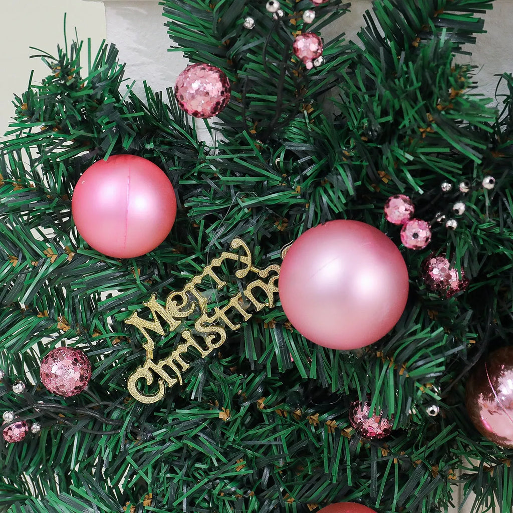 A 2.7-metre long pink Christmas rattan decoration with 240 small decorative heads, styled in a South Korea aesthetic.