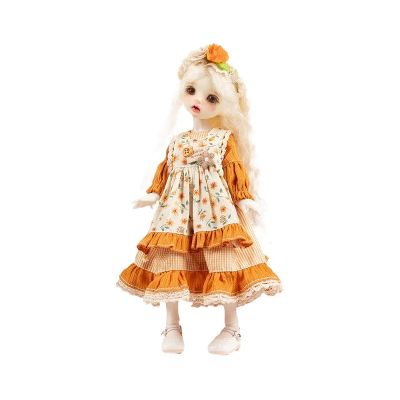 Printed cloth doll clothes for fashion dolls in various colourful patterns sold separately without dolls