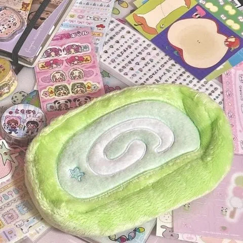 Honeydew colour Swiss roll cake design velvet pencil case in Korean style