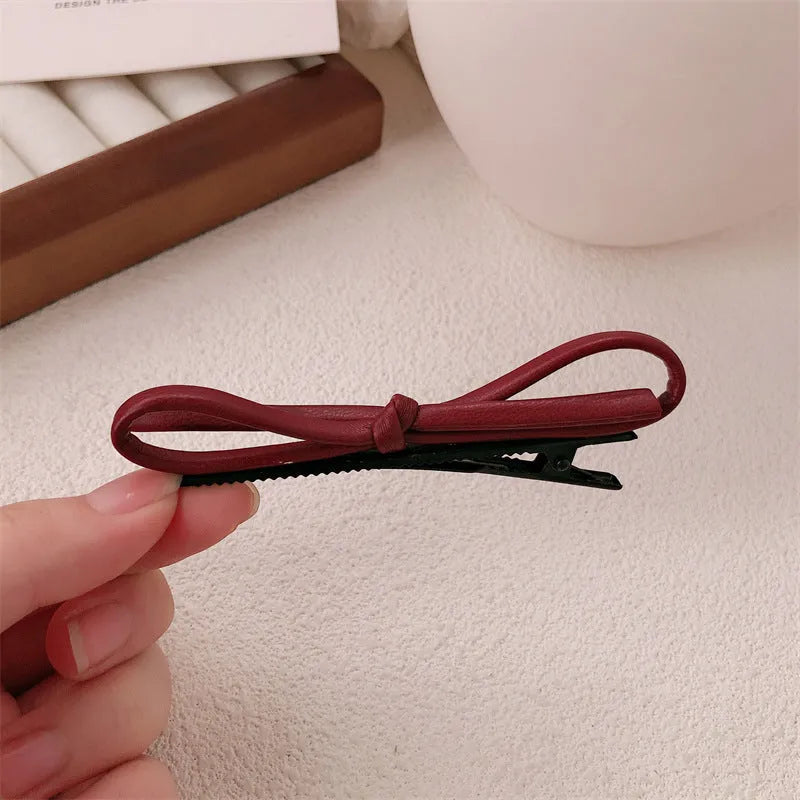Wine red leather bow barrette hair clip for women available in single or pair pack