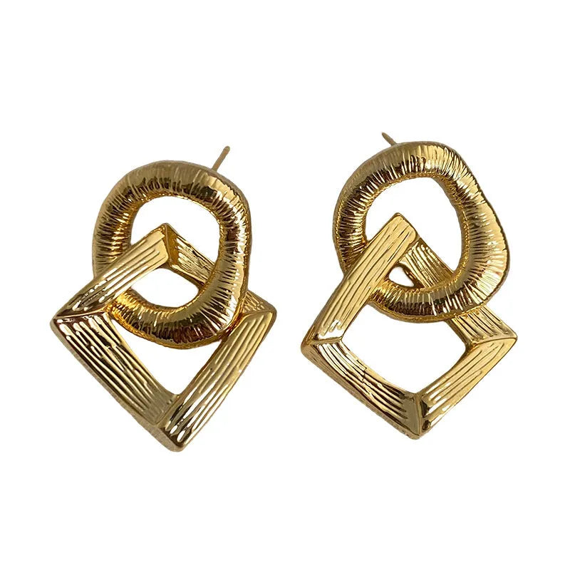 Geometric copper pendant earrings with 3.4cm drop and electroplated gold or silver finish