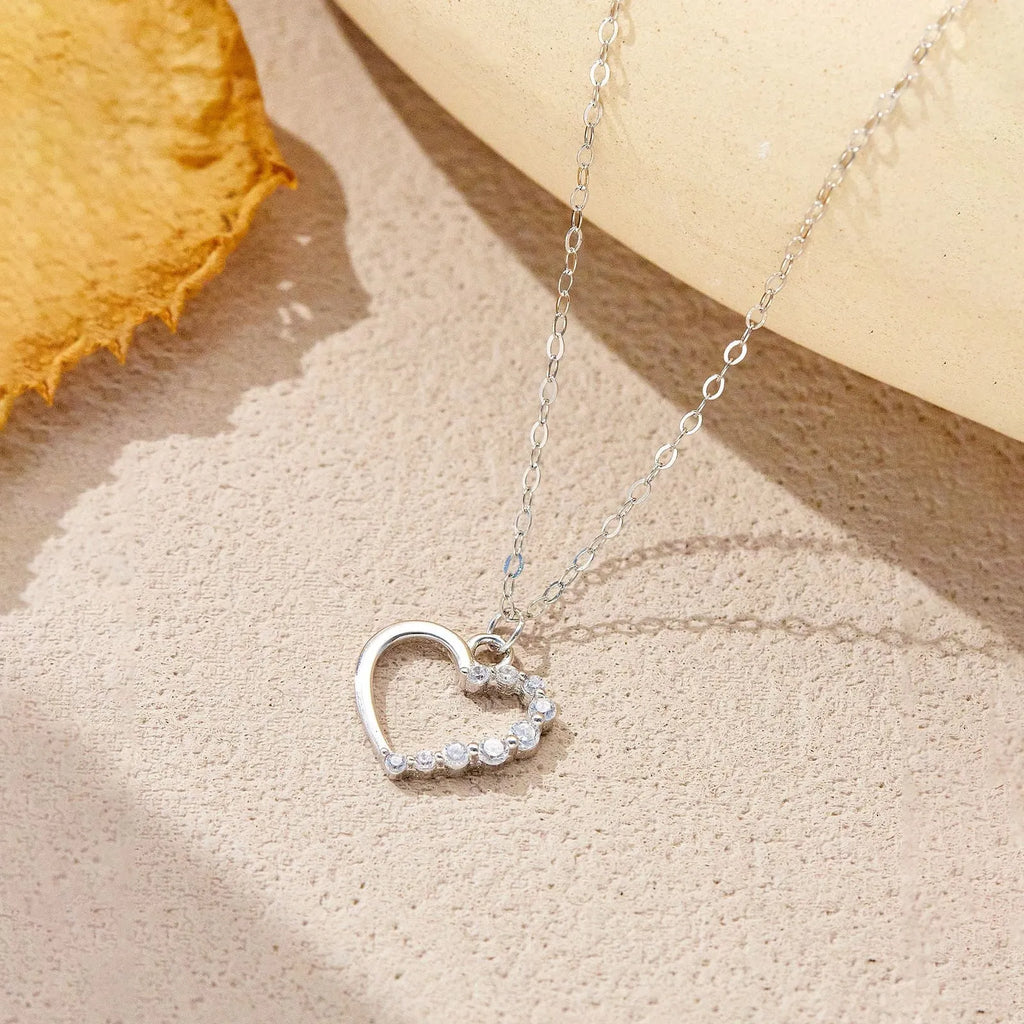 Sterling silver hollow heart necklace with 925 silver pendant on regular chain