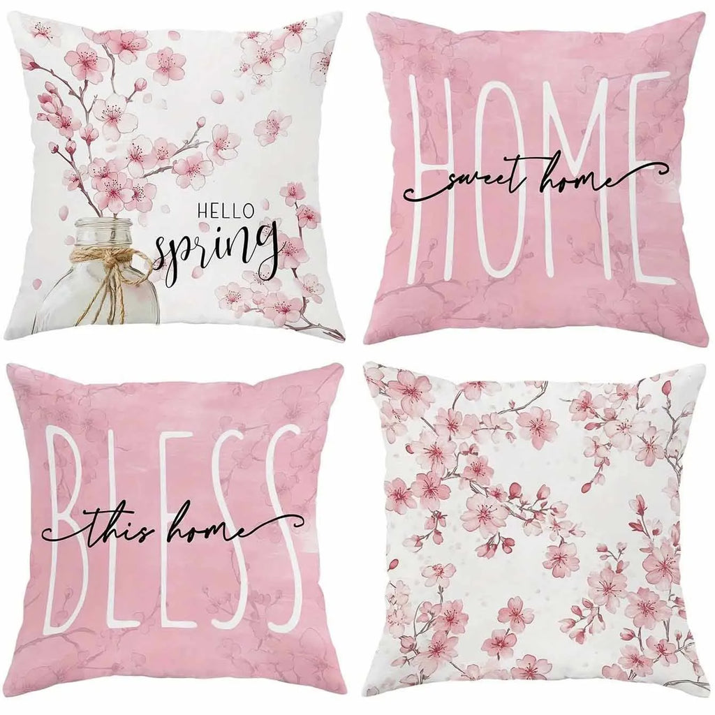 Short velvet cushion cover with cherry blossom letter print, 45cm square, shown in one of four colours.