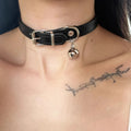 Black adjustable dog collar showing cat paw, bone, and plain leather decorative styles on a regular chain.