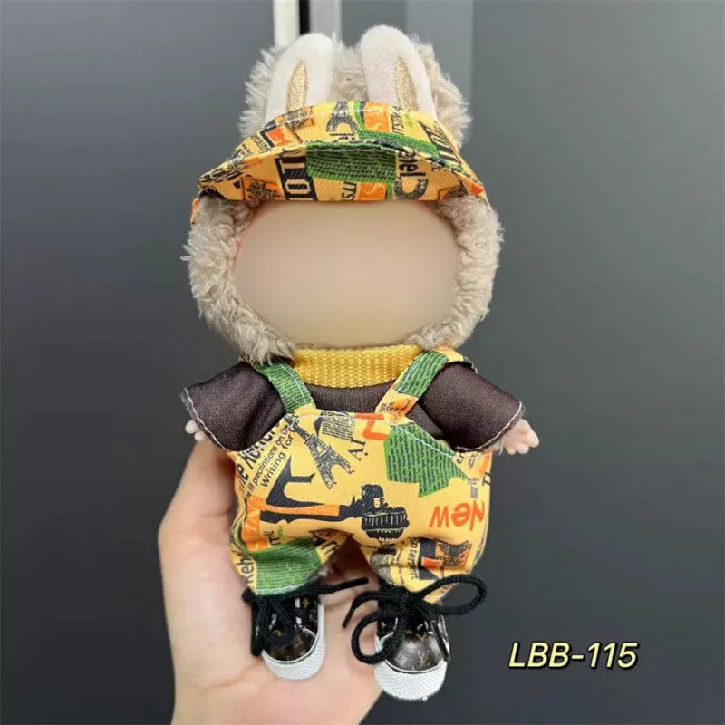 Plastic doll clothing costume for 17cm tall vinyl figurines on a display stand.