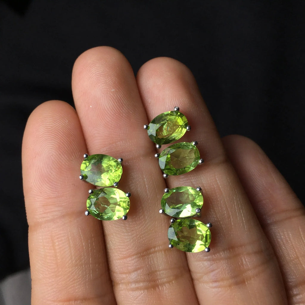 Natural olivine faceted stud earrings in S925 sterling silver with 6 × 8mm grass green oval stone
