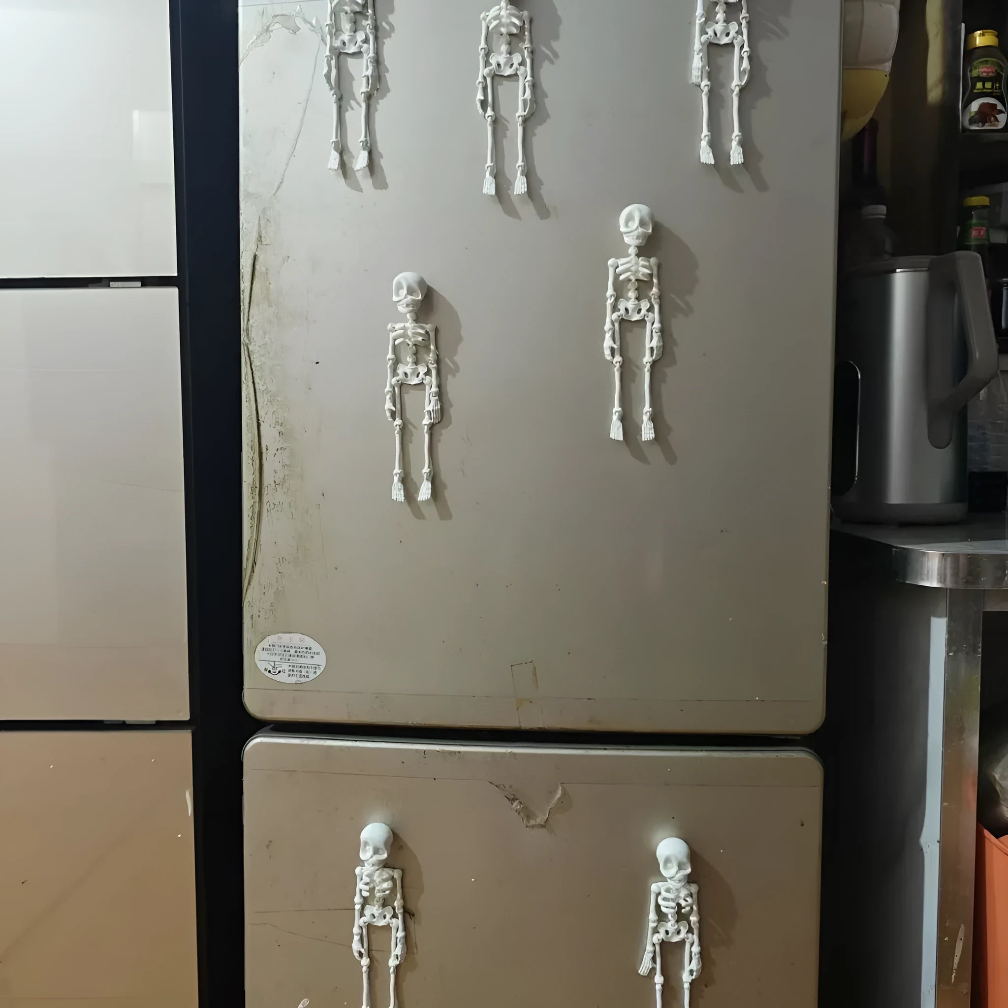 3D printed PLA skull ornament refrigerator magnet in assorted colours, 18cm high.
