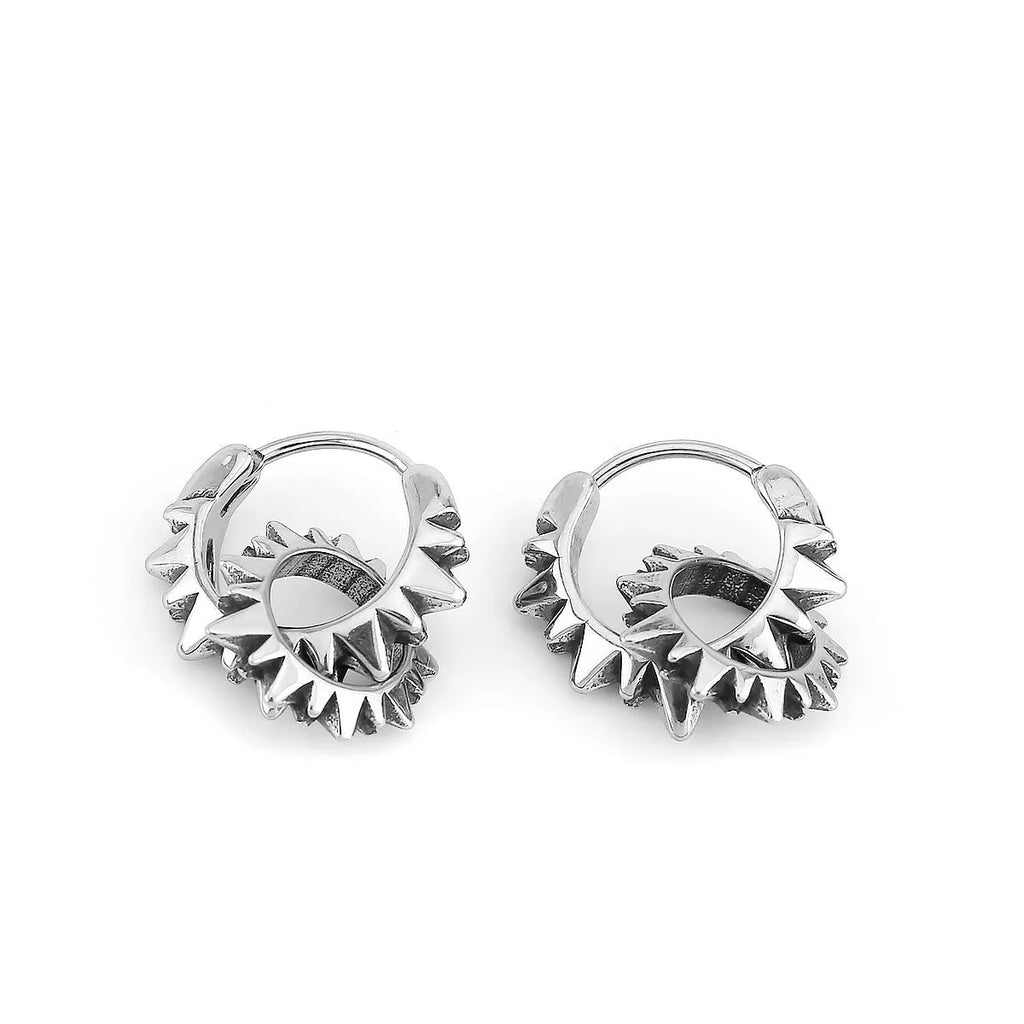 Stainless steel round ring earrings with polished steel finish and retro styling