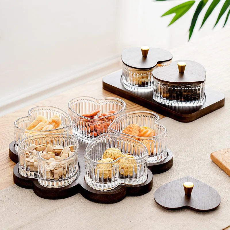 Glass fruit platter with coloured glaze and transparent heart-shaped lids in a 4-grid configuration.
