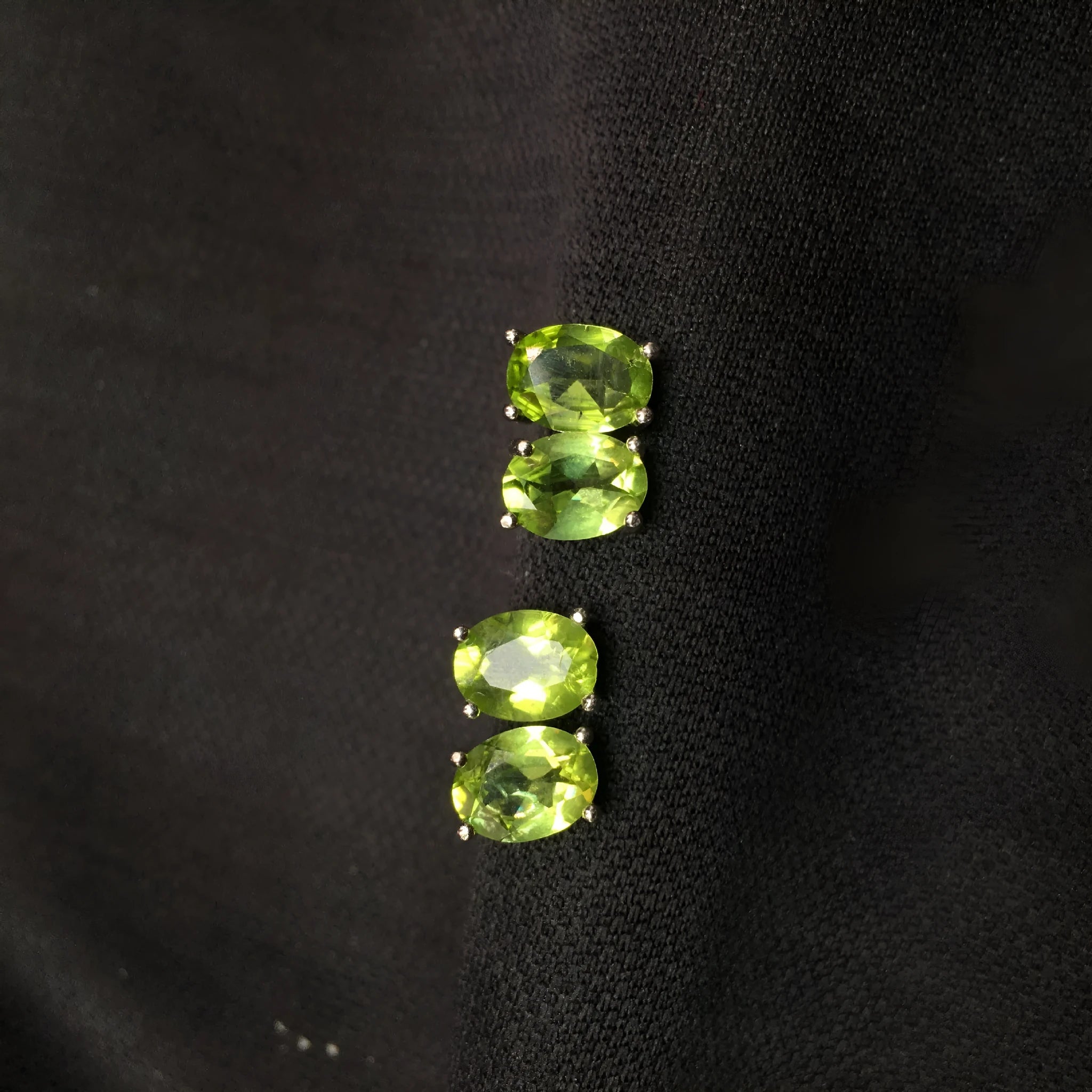 Natural olivine faceted stud earrings in S925 sterling silver with 6 × 8mm grass green oval stone