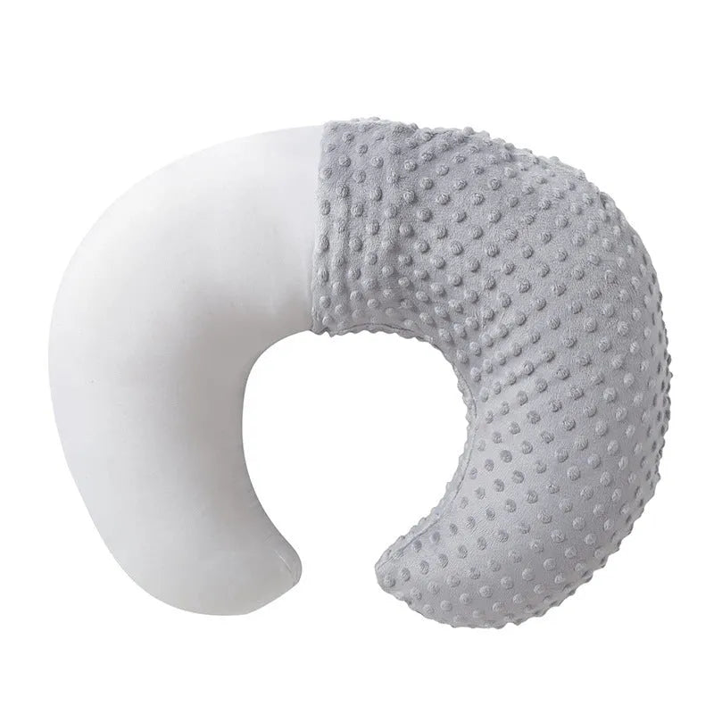 Multifunctional nursing pillow with milk spill prevention in pink colour for breastfeeding support