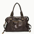 Women's retro shoulder messenger bag in soft PU leather with internal compartments and weaving detail