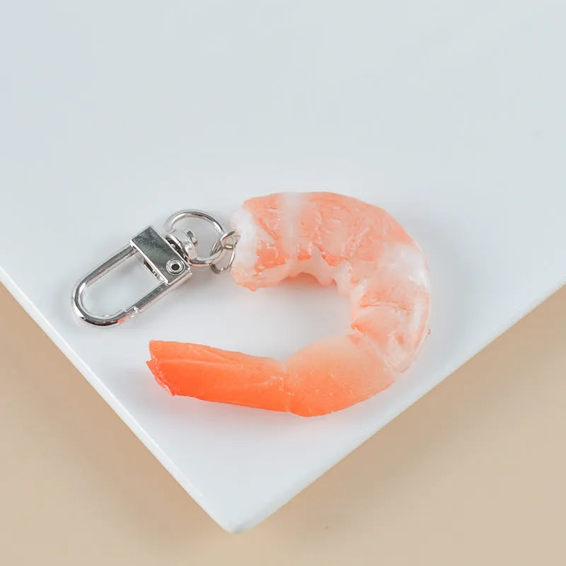 Detailed PVC simulation shrimp keychain with door buckle on a white background.