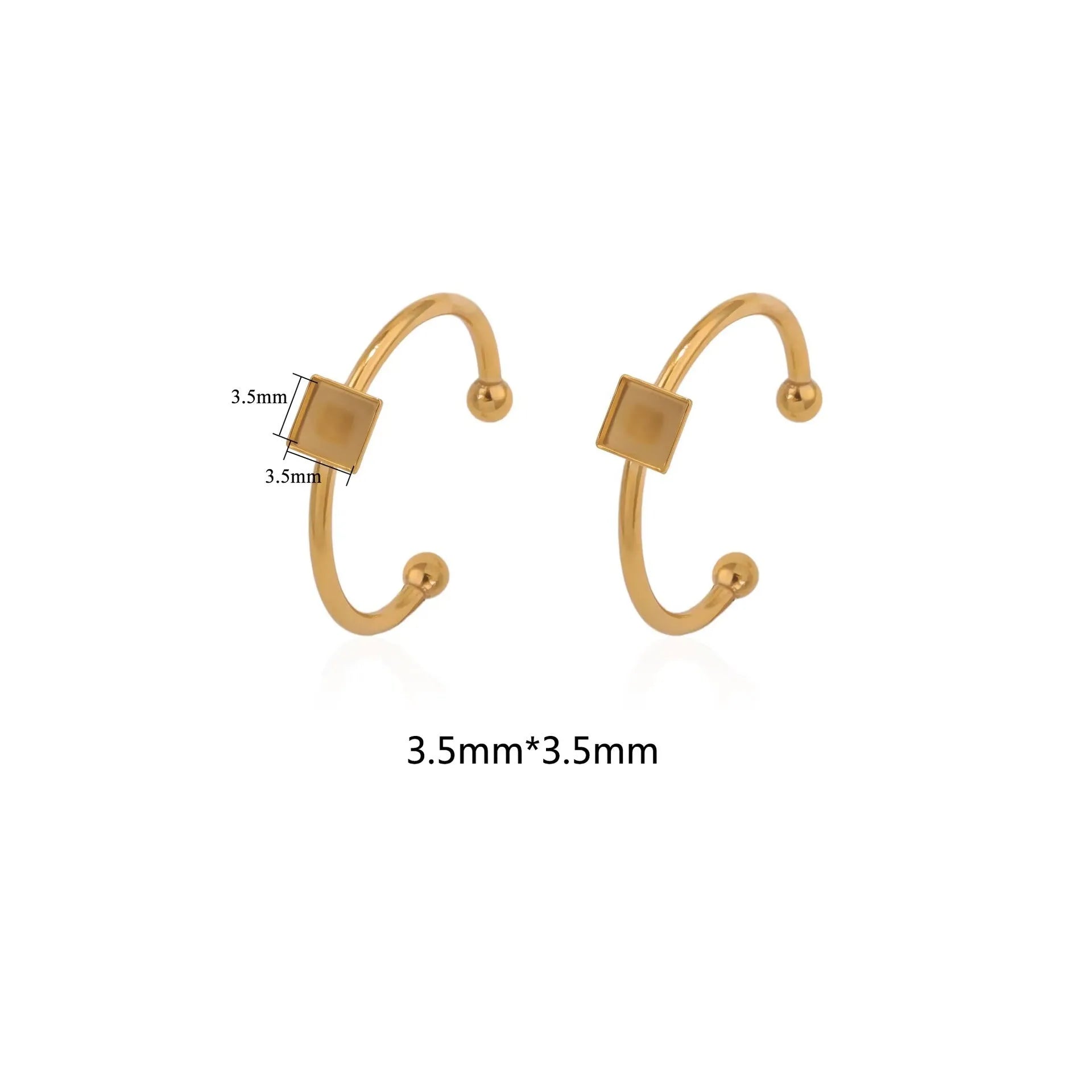 Assortment of golden electroplated stainless steel ring settings and DIY jewellery components in various shapes.