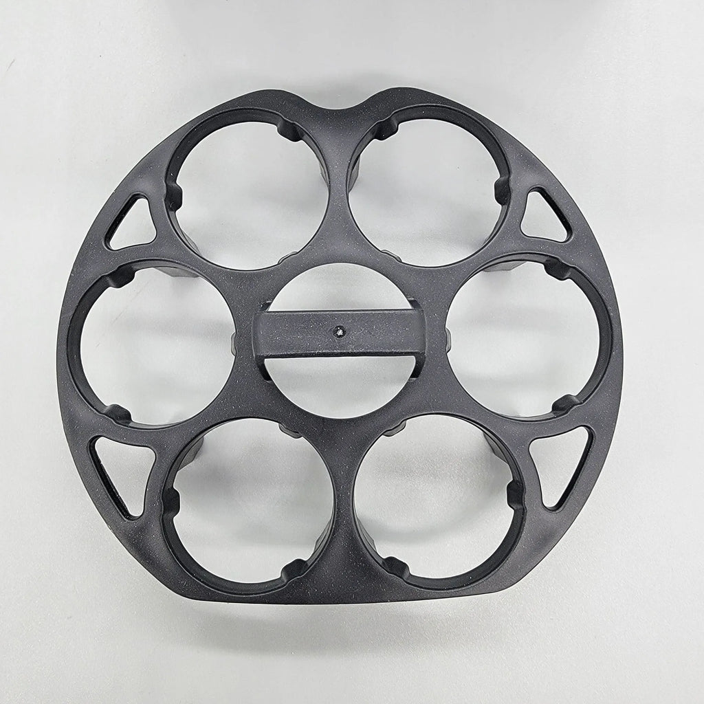 Black plastic egg holder basket for kitchen countertop storage.