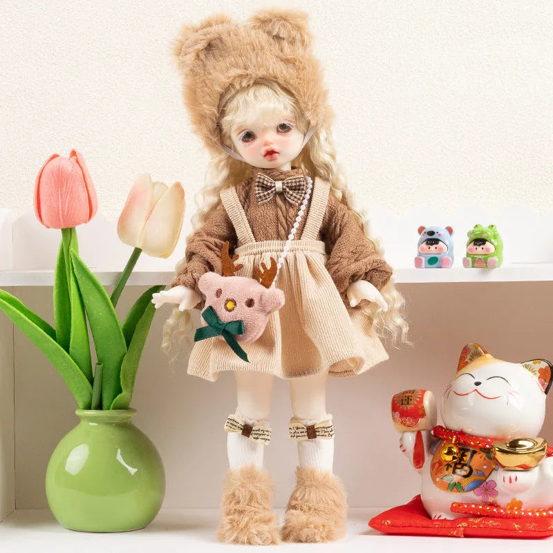 Printed cloth doll clothes for fashion dolls in various colourful patterns sold separately without dolls