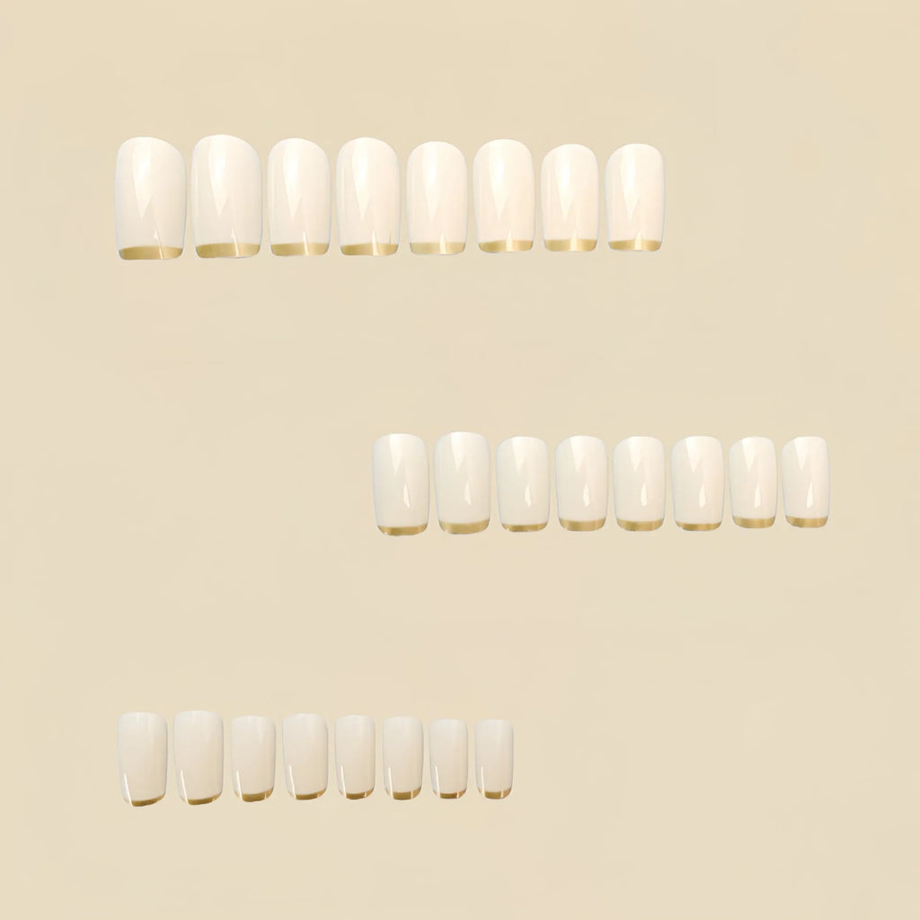 Mid-length European square nail art patch with white French tip and golden edge on a natural nail