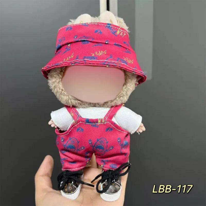 Plastic doll clothing costume for 17cm tall vinyl figurines on a display stand.