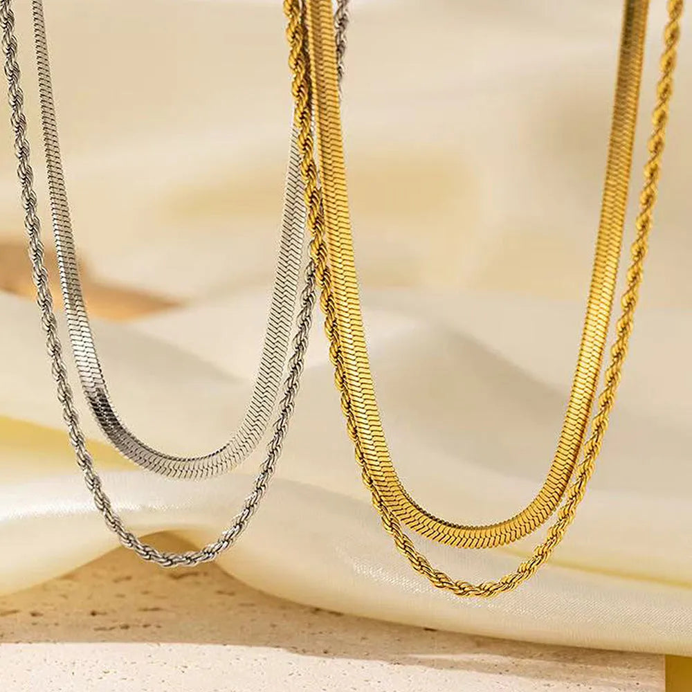 Stainless steel double-layer twist necklace with snake bones chain and geometric titanium steel pendant